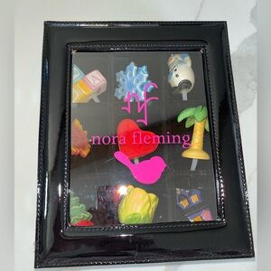 Nora Fleming black and pink case with 9 seasonal holiday mini charms